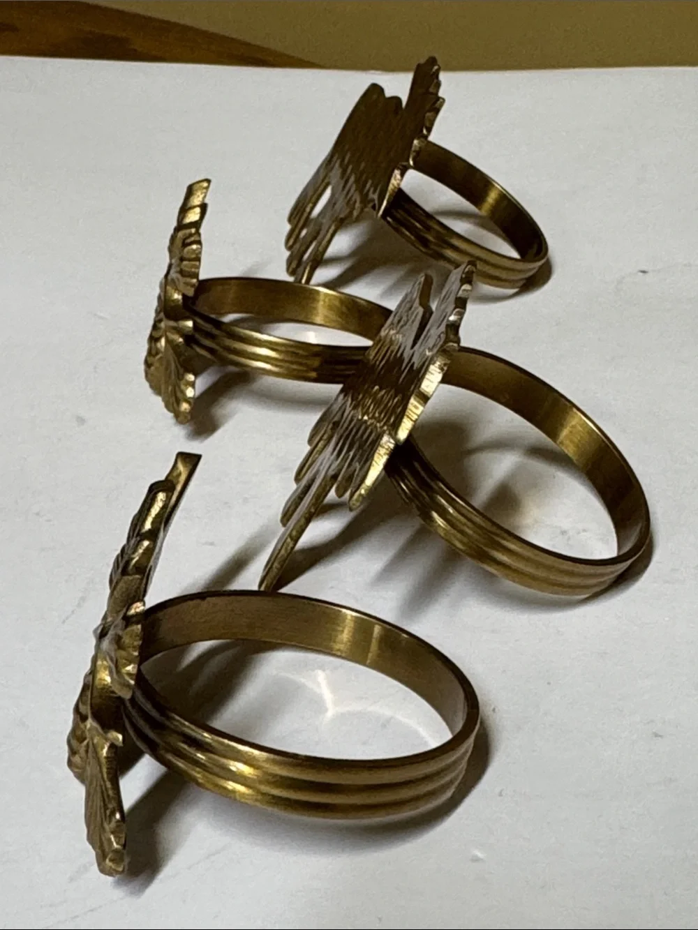 brass moose and pinecone and branch napkin rings set of 4